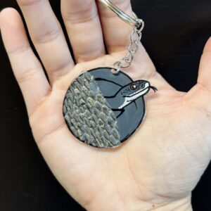 WILD Black Racer Shed Keychain